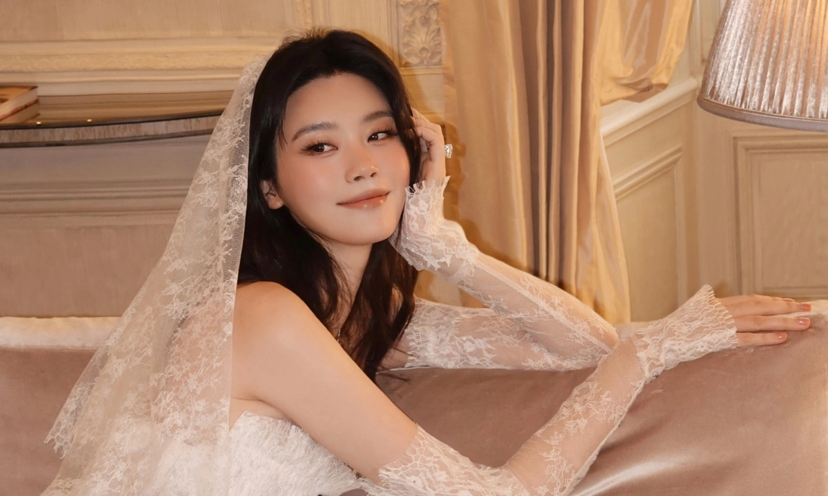 OK9 Việt Nam: Hề Mộng Dao rạng rỡ trong váy cưới thiết kế bởi nhà mốt Việt - hình ảnh - appok9.vip